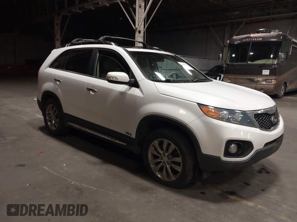 2011 Kia Sorento EX with VIN 5XYKUDA2XBG136475, listed as a IAAI auction lot 41795452 with 218,041 mi miles. Bid and sale history available at carsss.com. Image 1.