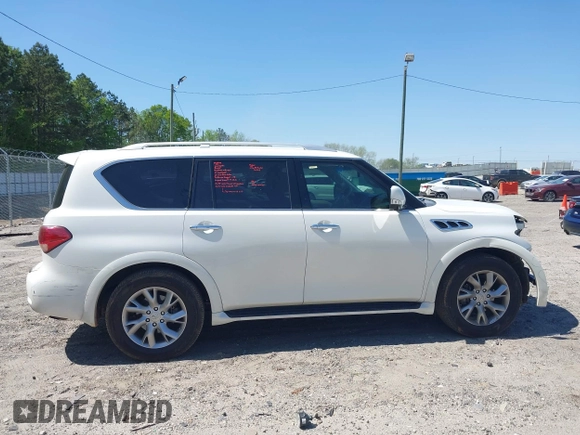 2012 Infiniti QX56 8-passenger with VIN JN8AZ2ND5C9716530, listed as a IAAI auction lot 42031101 with 153,432 mi miles and . Bid and sale history available at DreamBid. Image 14.