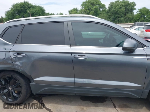 2022 Volkswagen Taos SE z VIN 3VVSX7B2XNM062037, wystawiony jako IAAI lot #42051064 z przebiegiem 30 149 mil mil oraz . Historia ofert i sprzedaży dostępna na DreamBid. Obrazek 14.