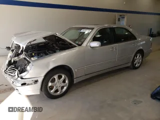 2002 Mercedes-Benz E-Class with VIN WDBJF65J12B499887, listed as a Copart auction lot 48708375 with 194,556 mi miles and Salvage Title. Bid and sale history available at carsss.com. Image 1.