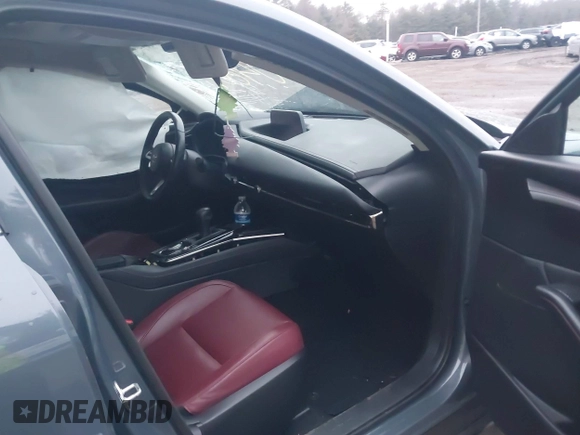 2023 Mazda CX-30 S Carbon Edition with VIN 3MVDMBCM5PM545150, listed as a IAAI auction lot 41104881 with 30,459 mi miles and . Bid and sale history available at DreamBid. Image 5.
