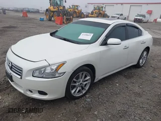 2014 Nissan Maxima S with VIN 1N4AA5AP0EC487139, listed as a IAAI auction lot 41450013 with 144,643 mi miles and . Bid and sale history available at DreamBid. Image 17.