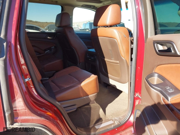 2016 Chevrolet Tahoe LTZ with VIN 1GNSKCKC9GR205745, listed as a IAAI auction lot 41710241 with 94,931 mi miles. Bid and sale history available at carsss.com. Image 8.