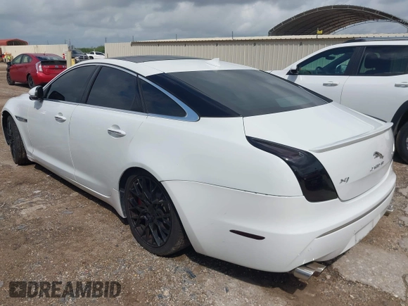 2014 Jaguar XJ R with VIN SAJWA1EK3EMV58692, listed as a IAAI auction lot 42663979 with 111,386 mi miles and . Bid and sale history available at DreamBid. Image 3.