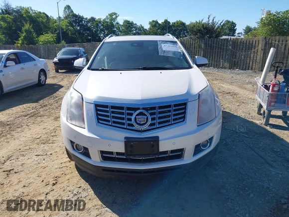 2013 Cadillac SRX Performance Collection with VIN 3GYFNHE31DS597987, listed as a IAAI auction lot 42319058 with 139,670 mi miles and . Bid and sale history available at DreamBid. Image 12.