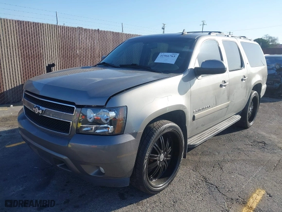 2009 Chevrolet Suburban LT w/2LT with VIN 1GNFC26069R190780, listed as a IAAI auction lot 41966765 with 206,413 mi miles. Bid and sale history available at carsss.com. Image 2.