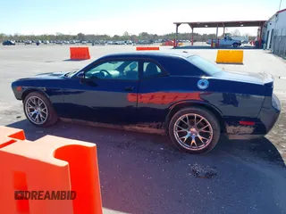 2013 Dodge Challenger R/T z VIN 2C3CDYBT7DH679522, wystawiony jako IAAI lot #41387221 z przebiegiem 122 147 mil mil oraz . Historia ofert i sprzedaży dostępna na DreamBid. Obrazek 14.