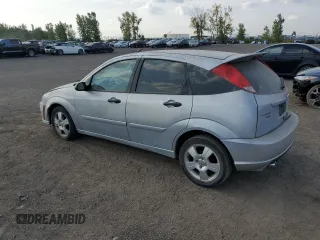 2007 Ford Focus S with VIN 1FAFP37N77W337626, listed as a Copart auction lot 70451294 with 174,068 mi miles and Salvage Title. Bid and sale history available at carsss.com. Image 2.
