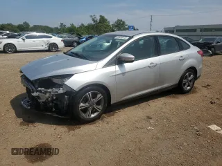 2017 Ford Focus SE with VIN 1FADP3FE7HL290271, listed as a Copart auction lot 60665615 with 130,409 mi miles and Salvage title. Bid and sale history available at DreamBid. Image 1.