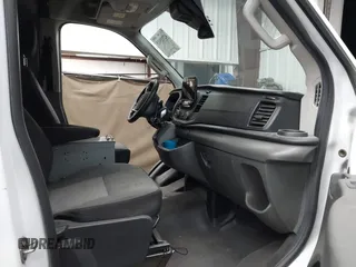 2020 Ford Transit Cargo with VIN 1FTBR1CG8LKB66921, listed as a IAAI auction lot 42325015 with Not provided miles and . Bid and sale history available at DreamBid. Image 5.