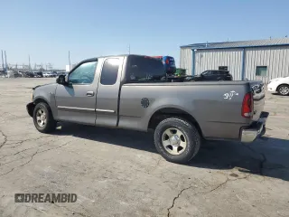 2002 Ford F-150 XL with VIN 1FTRX17222KA58070, listed as a Copart auction lot 52186295 with 0 mi miles and Salvage Title. Bid and sale history available at carsss.com. Image 2.