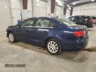 2013 Volkswagen Jetta SE with VIN 3VWDX7AJ7DM400165, listed as a Copart auction lot 55957145 with 175,668 mi miles and Salvage title. Bid and sale history available at DreamBid. Image 2.