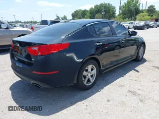 2014 Kia Optima LX with VIN 5XXGM4A78EG296882, listed as a IAAI auction lot 42126103 with 148,004 mi miles. Bid and sale history available at carsss.com. Image 4.