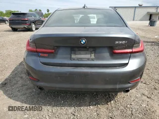 2020 BMW 3 Series 330i with VIN 3MW5R1J01L8B05802, listed as a Copart auction lot 52021825 with 86,214 mi miles and Salvage title. Bid and sale history available at DreamBid. Image 6.