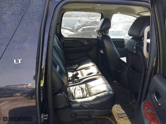 2014 Chevrolet Suburban LT with VIN 1GNSKJE75ER214054, listed as a IAAI auction lot 41426895 with 301,554 mi miles. Bid and sale history available at carsss.com. Image 8.