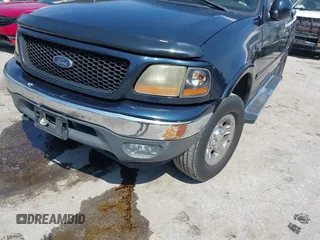 2001 Ford F-150 XLT with VIN 1FTRW08L71KC63676, listed as a IAAI auction lot 42536000 with 326,699 mi miles and . Bid and sale history available at DreamBid. Image 17.