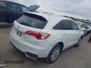 2017 Acura RDX with VIN 5J8TB3H31HL011012, listed as a IAAI auction lot 41504854 with 165,266 mi miles. Bid and sale history available at carsss.com. Image 4.