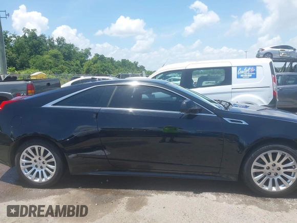 2012 Cadillac CTS Performance z VIN 1G6DJ1E31C0139231, wystawiony jako IAAI lot #42446853 z przebiegiem 102 857 mil mil oraz . Historia ofert i sprzedaży dostępna na DreamBid. Obrazek 13.