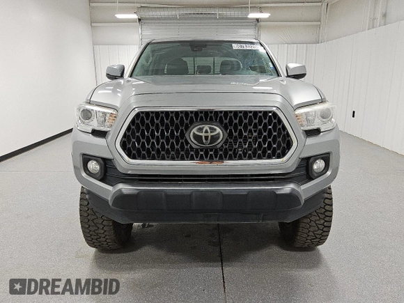 2020 Toyota Tacoma SR5 z VIN 5TFAZ5CN9LX089772, wystawiony jako Copart lot #60783225 z przebiegiem 59 592 mil mil oraz Czysty tytuł • Clean title. Historia ofert i sprzedaży dostępna na DreamBid. Obrazek 5.