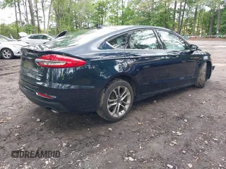 2020 Ford Fusion SEL with VIN 3FA6P0CD1LR180409, listed as a IAAI auction lot 42384311 with 39,163 mi miles and . Bid and sale history available at DreamBid. Image 4.