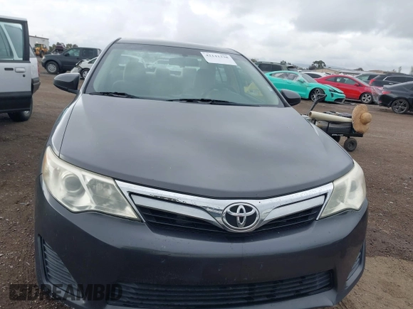 2014 Toyota Camry L with VIN 4T1BF1FK5EU403313, listed as a IAAI auction lot 42141338 with 185,925 mi miles and . Bid and sale history available at DreamBid. Image 12.