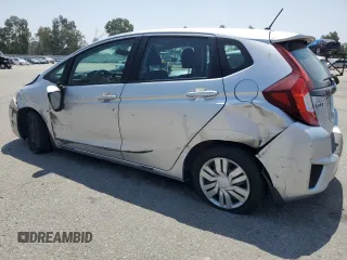 2015 Honda Fit LX with VIN 3HGGK5H55FM748370, listed as a Copart auction lot 61524455 with 87,235 mi miles and Salvage title. Bid and sale history available at DreamBid. Image 2.