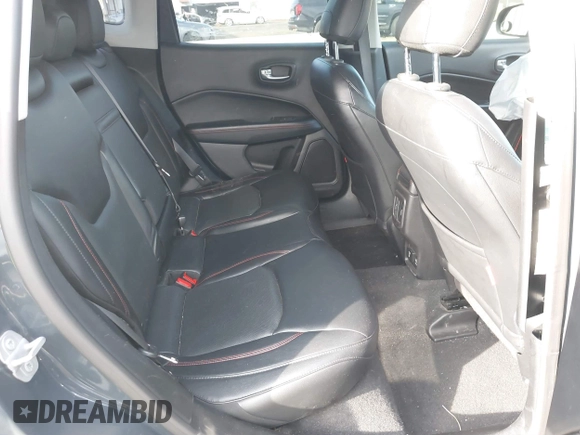 2017 Jeep Compass Trailhawk with VIN 3C4NJDDBXHT657425, listed as a IAAI auction lot 41022289 with 83,003 mi miles and . Bid and sale history available at DreamBid. Image 8.