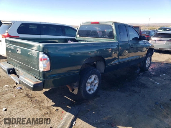 1999 Dodge Dakota SLT with VIN 1B7GG22X0XS239398, listed as a Copart auction lot 80143414 with 147,646 mi miles and Salvage Title. Bid and sale history available at DreamBid. Image 3.