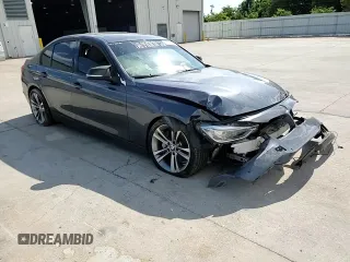 2012 BMW 3 Series 335i with VIN WBA3A9C5XCF474803, listed as a Copart auction lot 57940675 with 121,960 mi miles and Salvage title. Bid and sale history available at DreamBid. Image 13.