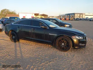 2018 Jaguar XJ with VIN SAJWJ2GD3J8W15092, listed as a IAAI auction lot 41844106 with 56,357 mi miles. Bid and sale history available at carsss.com. Image 1.
