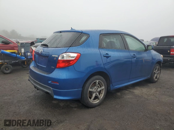 2009 Toyota Matrix S with VIN 2T1LE40E29C011912, listed as a Copart auction lot 57103465 with 128,900 mi miles and Salvage title. Bid and sale history available at DreamBid. Image 3.