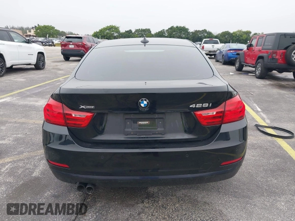 2016 BMW 4 Series 428i xDrive with VIN WBA4C9C58GG136248, listed as a IAAI auction lot 41346270 with 129,464 mi miles and . Bid and sale history available at carsss.com. Image 17.