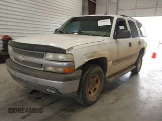2005 Chevrolet Tahoe LS with VIN 1GNEC13V75J186607, listed as a IAAI auction lot 42090566 with 244,715 mi miles. Bid and sale history available at carsss.com. Image 2.