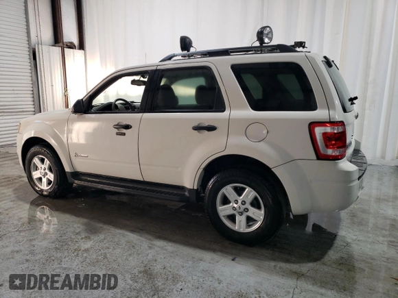 2011 Ford Escape Hybrid with VIN 1FMCU4K35BKC23461, listed as a Copart auction lot 73209354 with 3,888 mi miles and Clean title. Bid and sale history available at DreamBid. Image 2.