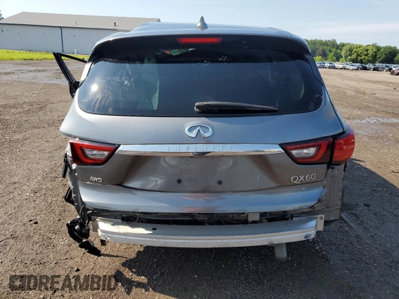 2020 Infiniti QX60 Pure with VIN 5N1DL0MM0LC530618, listed as a Copart auction lot 61285215 with 80,658 mi miles and Salvage title. Bid and sale history available at DreamBid. Image 6.
