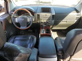 2004 Infiniti QX56 with VIN 5N3AA08C74N812357, listed as a Copart auction lot 69843174 with 0 mi miles and Salvage Title. Bid and sale history available at carsss.com. Image 9.