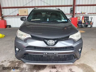 2016 Toyota RAV4 SE with VIN JTMJFREV7GJ072488, listed as a IAAI auction lot 42031254 with 106,901 mi miles. Bid and sale history available at carsss.com. Image 12.