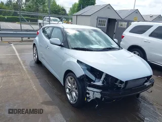 2015 Hyundai Veloster z VIN KMHTC6AD8FU222744, wystawiony jako IAAI lot #42129397 z przebiegiem Nie podano mil oraz . Historia ofert i sprzedaży dostępna na DreamBid. Obrazek 1.