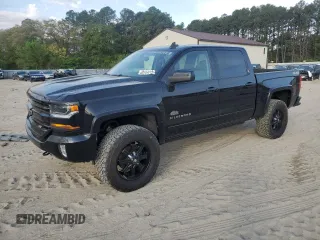 2017 Chevrolet Silverado 1500 LT with VIN 3GCUKREC1HG233234, listed as a Copart auction lot 48144415 with 79,248 mi miles and Salvage Title. Bid and sale history available at DreamBid. Image 1.