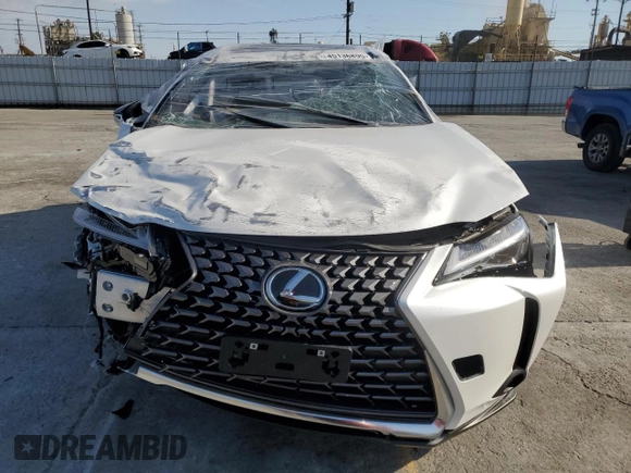 2025 Lexus UX with VIN JTHYBJAHXS2013108, listed as a Copart auction lot 45136895 with 1,350 mi miles and Salvage title. Bid and sale history available at DreamBid. Image 5.