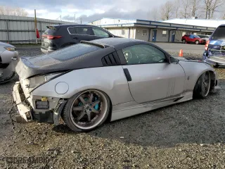 2003 Nissan 350Z Touring with VIN JN1AZ34E43T011803, listed as a Copart auction lot 85707794 with 0 miles and Salvage Title. Bid and sale history available at carsss.com. Image 3.
