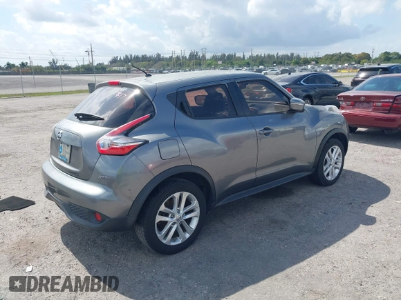 2015 Nissan Juke SV with VIN JN8AF5MV8FT553710, listed as a IAAI auction lot 41522207 with 114,824 mi miles. Bid and sale history available at carsss.com. Image 4.