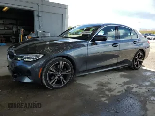2021 BMW 3 Series 330i with VIN 3MW5R1J05M8B89334, listed as a Copart auction lot 61743965 with 25,805 mi miles and Salvage title. Bid and sale history available at DreamBid. Image 1.