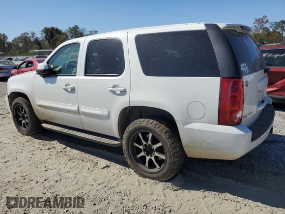 2007 GMC Yukon SLE with VIN 1GKFK13017J109923, listed as a Copart auction lot 77085954 with 214,986 mi miles and Salvage Title. Bid and sale history available at carsss.com. Image 2.