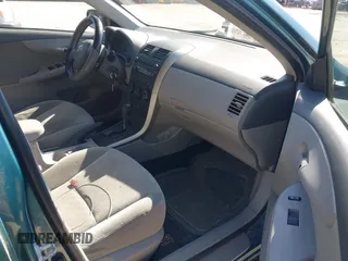 2009 Toyota Corolla with VIN JTDBL40E299037014, listed as a IAAI auction lot 42078954 with 86,559 mi miles. Bid and sale history available at carsss.com. Image 5.