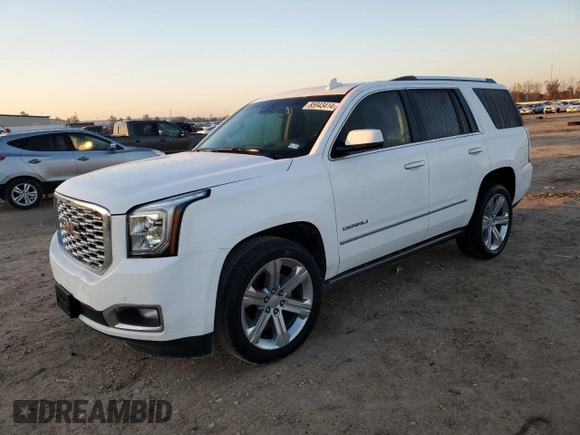 2019 GMC Yukon Denali with VIN 1GKS1CKJ6KR122376, listed as a Copart auction lot 85943414 with 90,614 mi miles and Salvage Title. Bid and sale history available at carsss.com. Image 1.