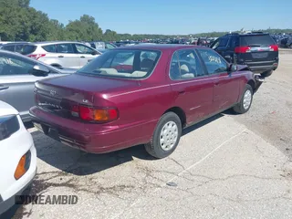 1996 Toyota Camry DX with VIN 4T1BG12K9TU691837, listed as a IAAI auction lot 40267369 with 36,383 mi miles. Bid and sale history available at carsss.com. Image 4.