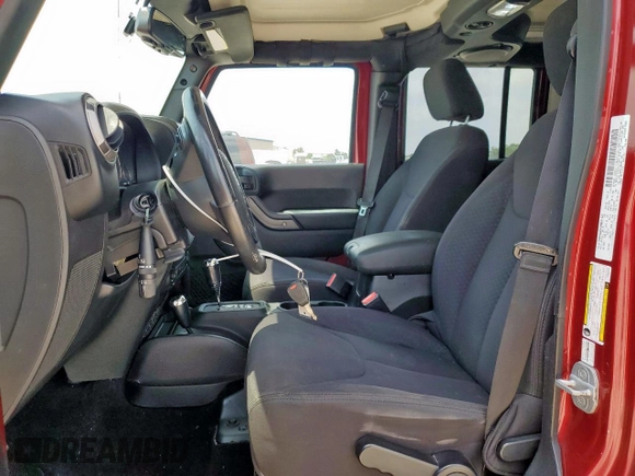 2013 Jeep Wrangler Unlimited Sport z VIN 1C4BJWDGXDL606491, wystawiony jako Copart lot #56065425 z przebiegiem 168 709 mil mil oraz Szkoda całkowita • Salvage title. Historia ofert i sprzedaży dostępna na DreamBid. Obrazek 7.