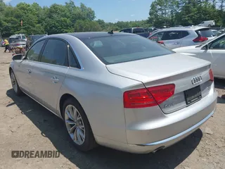 2011 Audi A8 with VIN WAURVAFD4BN019033, listed as a IAAI auction lot 42532173 with 97,486 mi miles and . Bid and sale history available at DreamBid. Image 3.