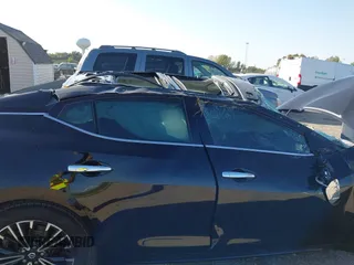 2019 Nissan Maxima Platinum z VIN 1N4AA6AV3KC378092, wystawiony jako IAAI lot #40527428 z przebiegiem 108 643 mil mil oraz . Historia ofert i sprzedaży dostępna na DreamBid. Obrazek 6.